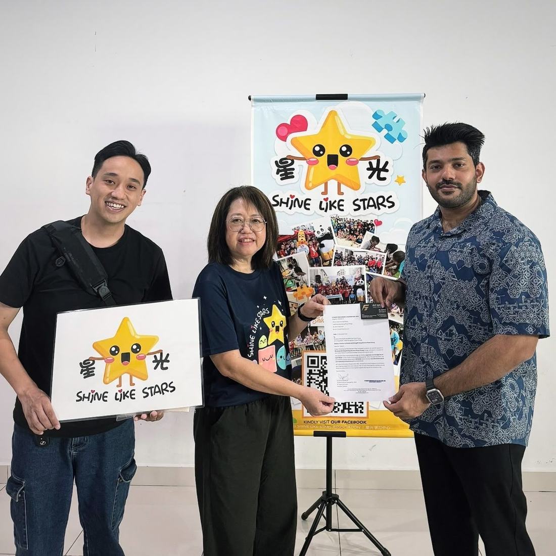 Presenting a letter of support to Shine Like Stars
